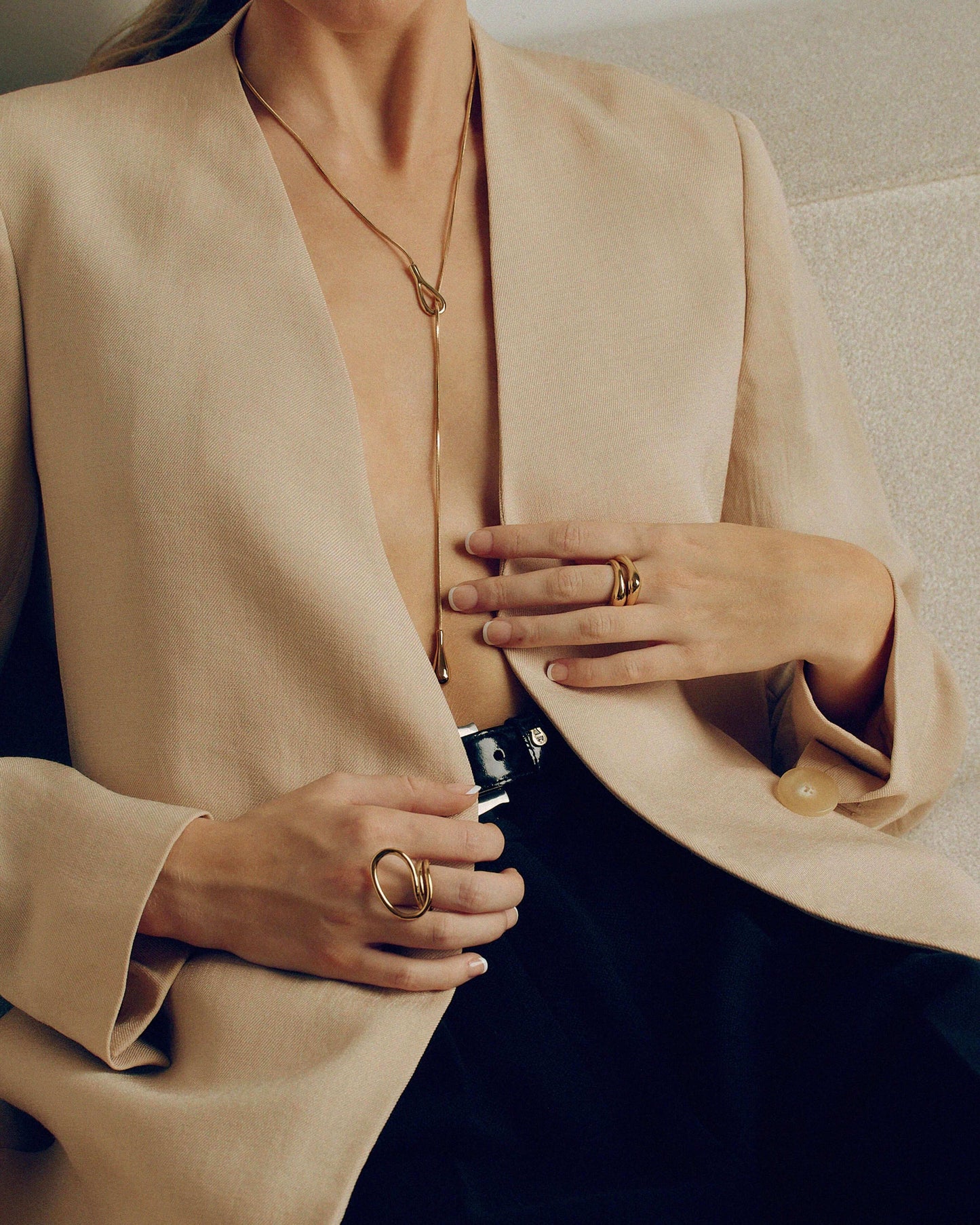 Adjustable gold or silver necklace worn long or as a choker, non-tarnish finish, versatile for layering or statement looks.