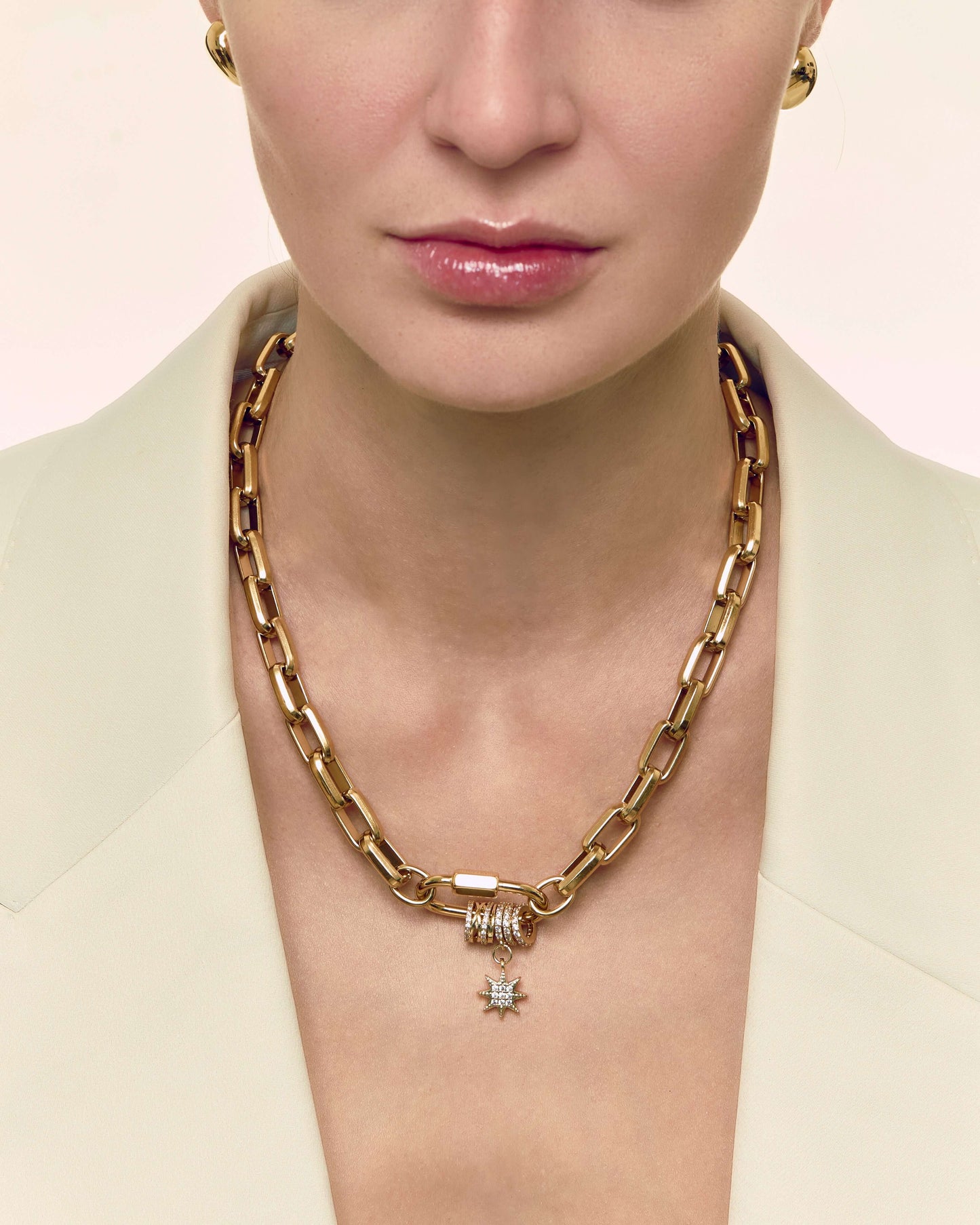 Carabiner pave pendant with sparkling zircon charms on chunky oval link chain, perfect for layering or bold standalone styling.