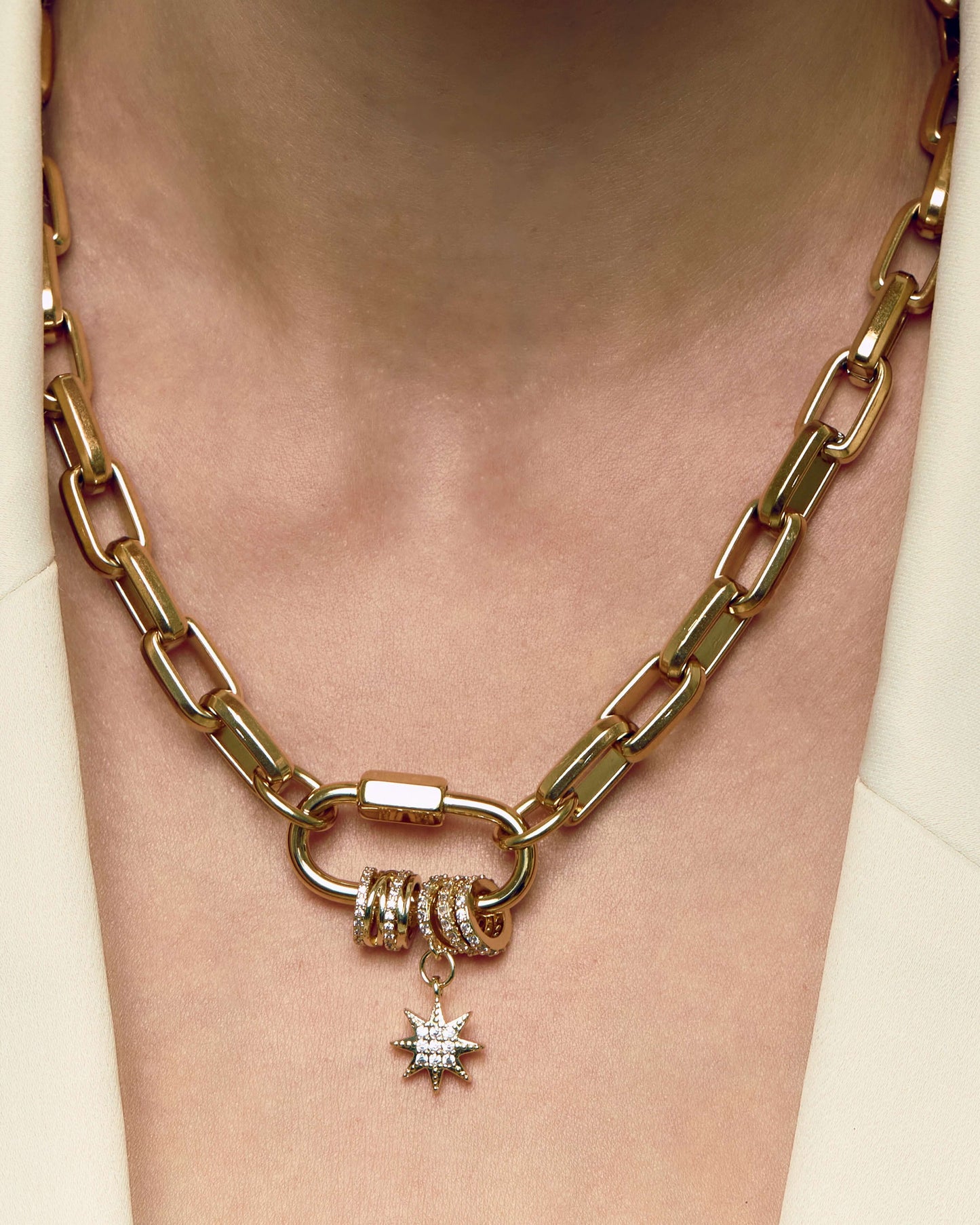 Carabiner pave pendant with sparkling zircon charms on chunky oval link chain, perfect for layering or bold standalone styling.