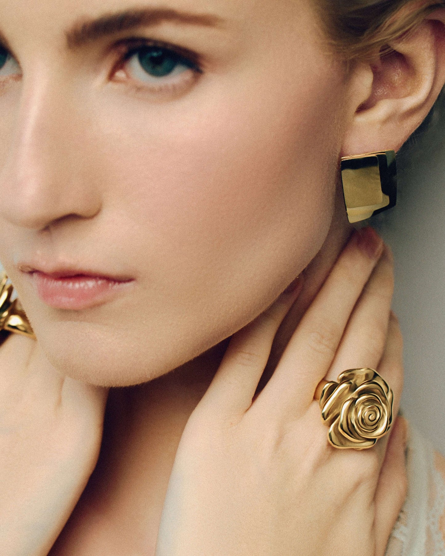 Oversized gold rose ring with sculpted layered petals in a realistic blooming flower design. Bold statement ring with a shiny polished finish, adding elegance and drama to any outfit. Perfect for floral jewelry lovers looking for a standout piece for everyday wear, events, or special occasions.