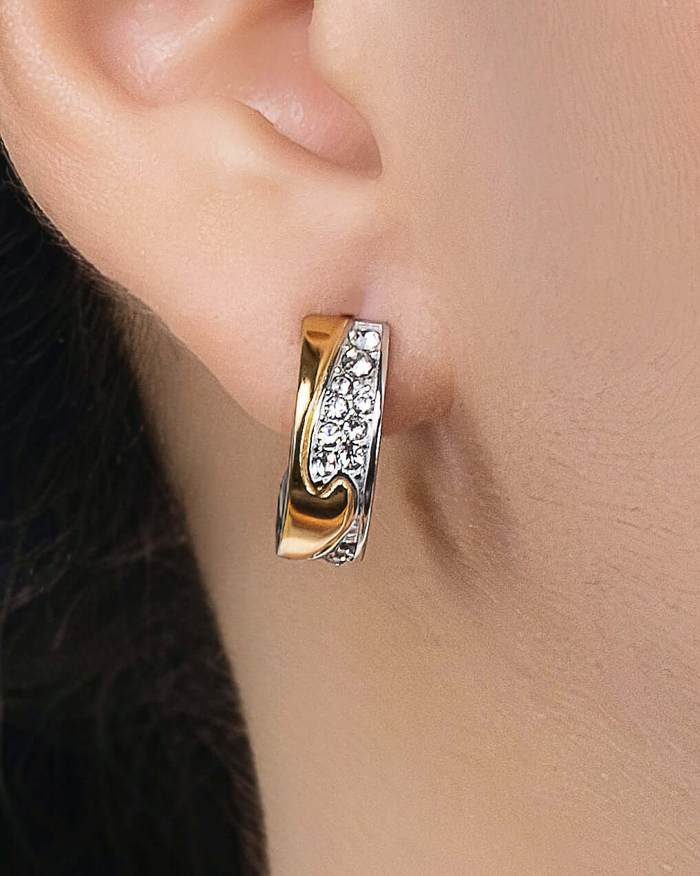 Two tone CZ hoop earrings in gold and silver with sparkling crystal pavé stones, chunky huggie hoop earrings for women, modern mixed metal statement jewelry.