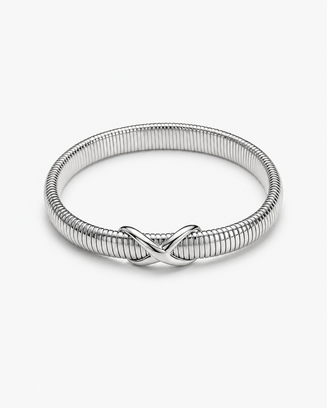 A silver-toned metal bangle bracelet with a textured, ribbed snake-style band and an infinity symbol at the center, shown on a clean white background.
