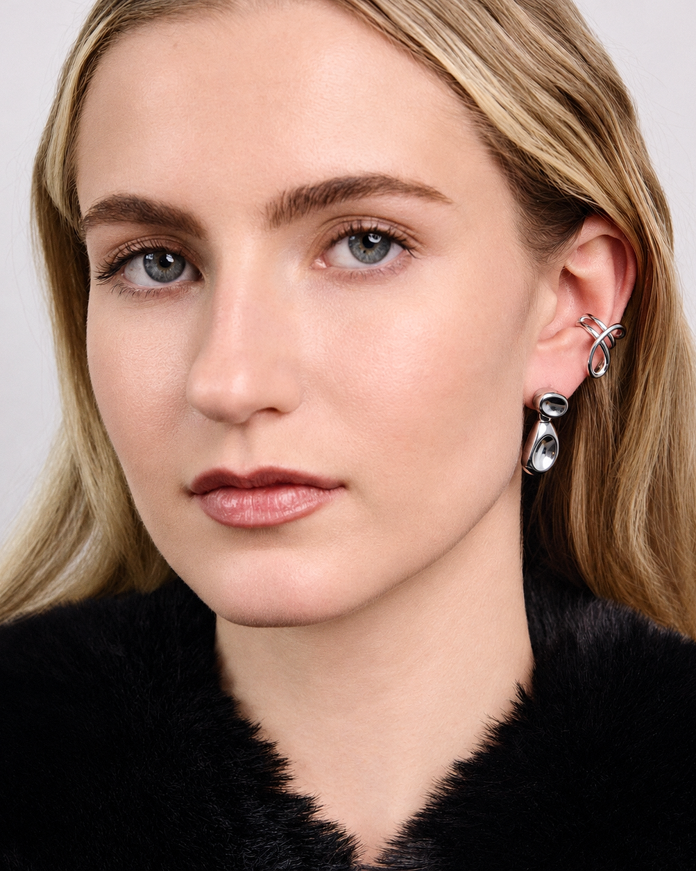 Loop Wrap Ear Cuff in gold or silver with sculptural non pierced open loop design, modern statement ear jewelry for men and women