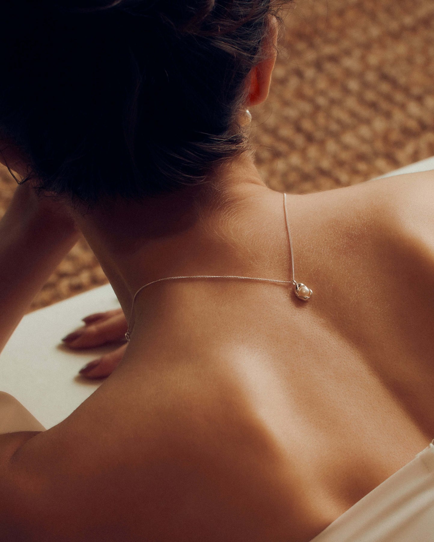 Dainty freshwater pearl pendant necklace on a delicate chain, perfect for everyday wear or adding a soft, elegant statement.