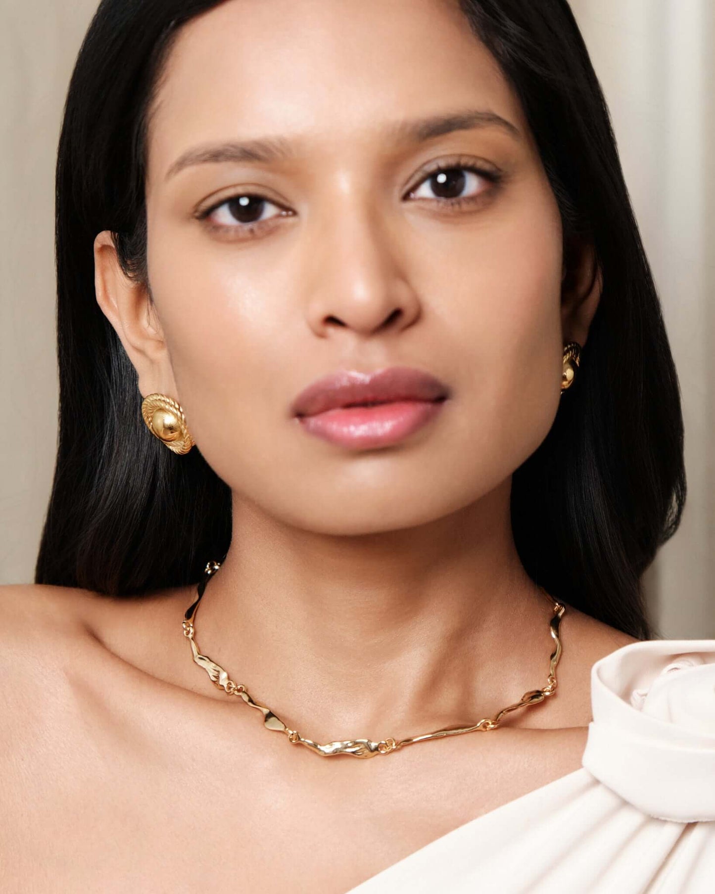 Gold rope dome stud earrings with textured twisted border and polished finish