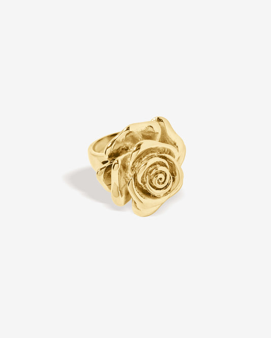 Oversized gold rose ring with sculpted layered petals in a realistic blooming flower design. Bold statement ring with a shiny polished finish, adding elegance and drama to any outfit. Perfect for floral jewelry lovers looking for a standout piece for everyday wear, events, or special occasions.