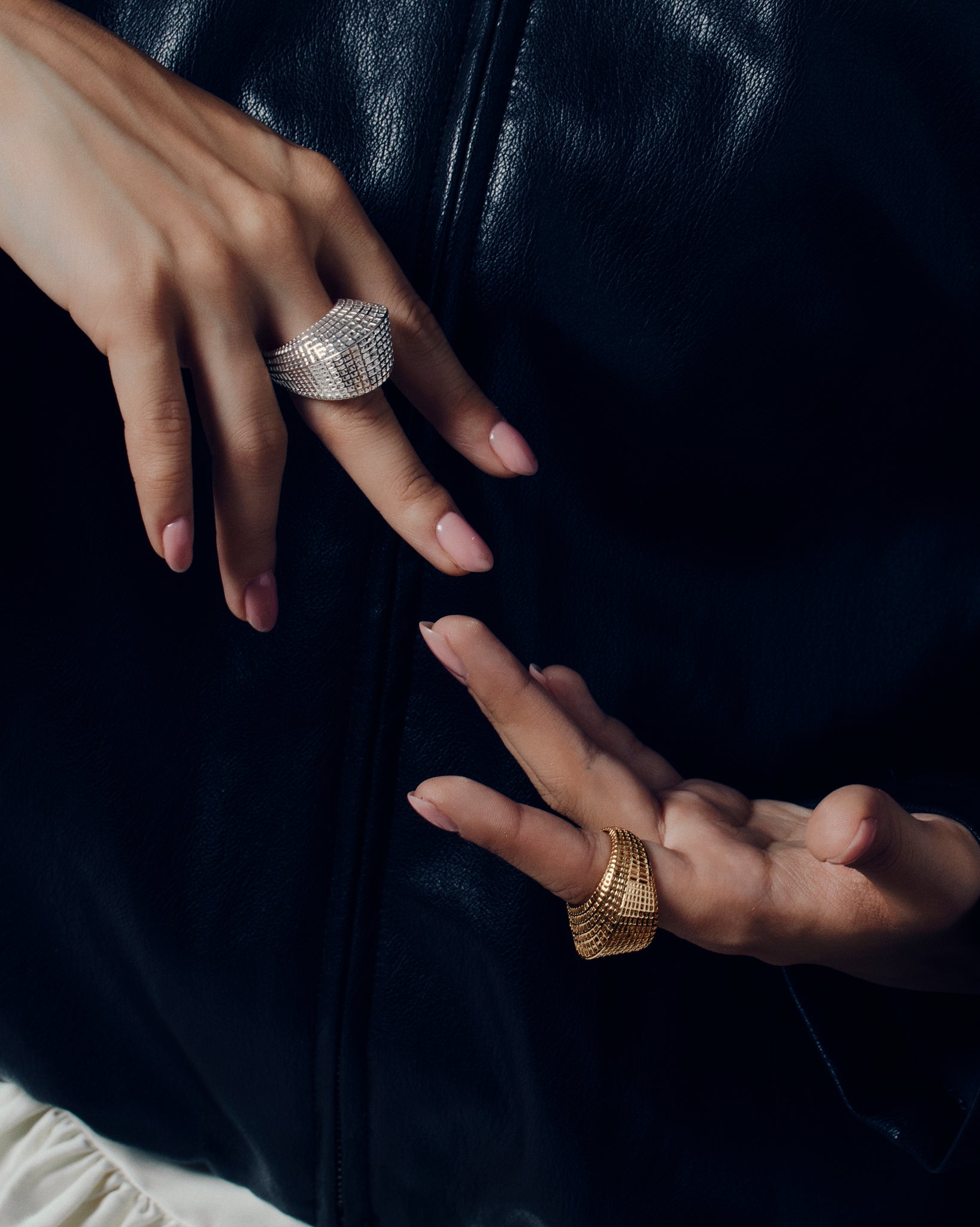 Gold open-work grid ring with a sculptural geometric pattern and bold rounded band. This chunky gold statement ring features a modern lattice texture that gives it depth and dimension while remaining lightweight and comfortable. Crafted in polished gold-tone metal, it adds a refined, architectural edge to everyday or occasion wear.