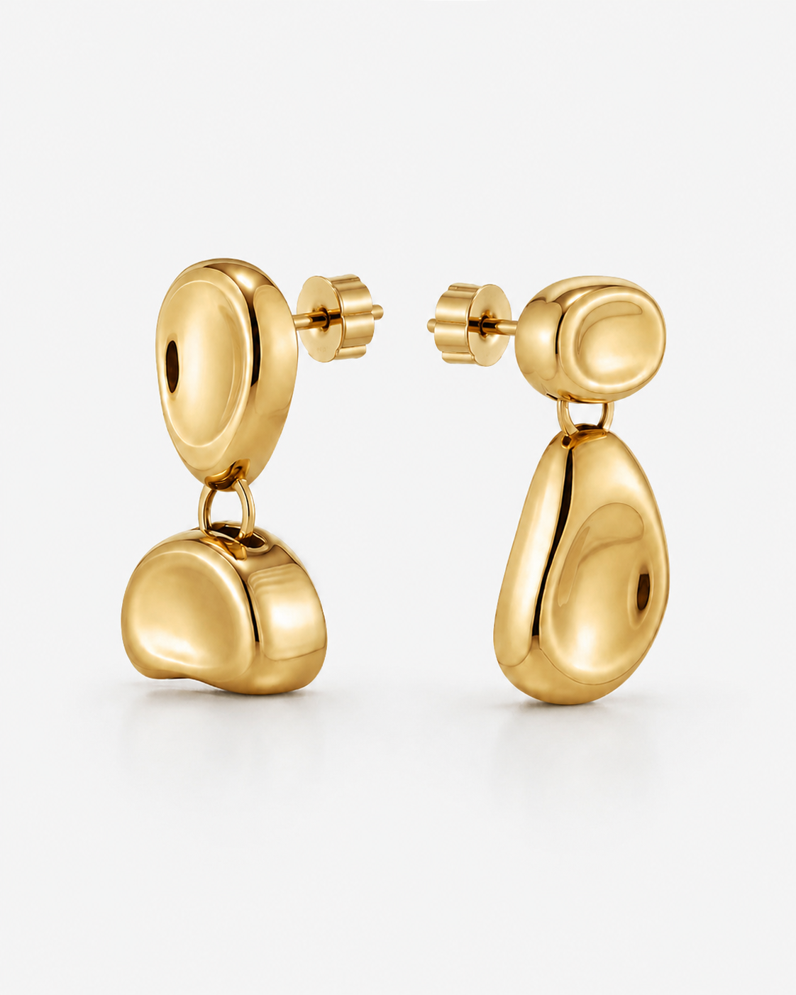 Double Bean Drop Earrings in gold or silver finish featuring a sculptural organic bean design, polished statement drop earrings, modern minimalist jewelry, chunky contemporary earrings for everyday wear and special occasions.