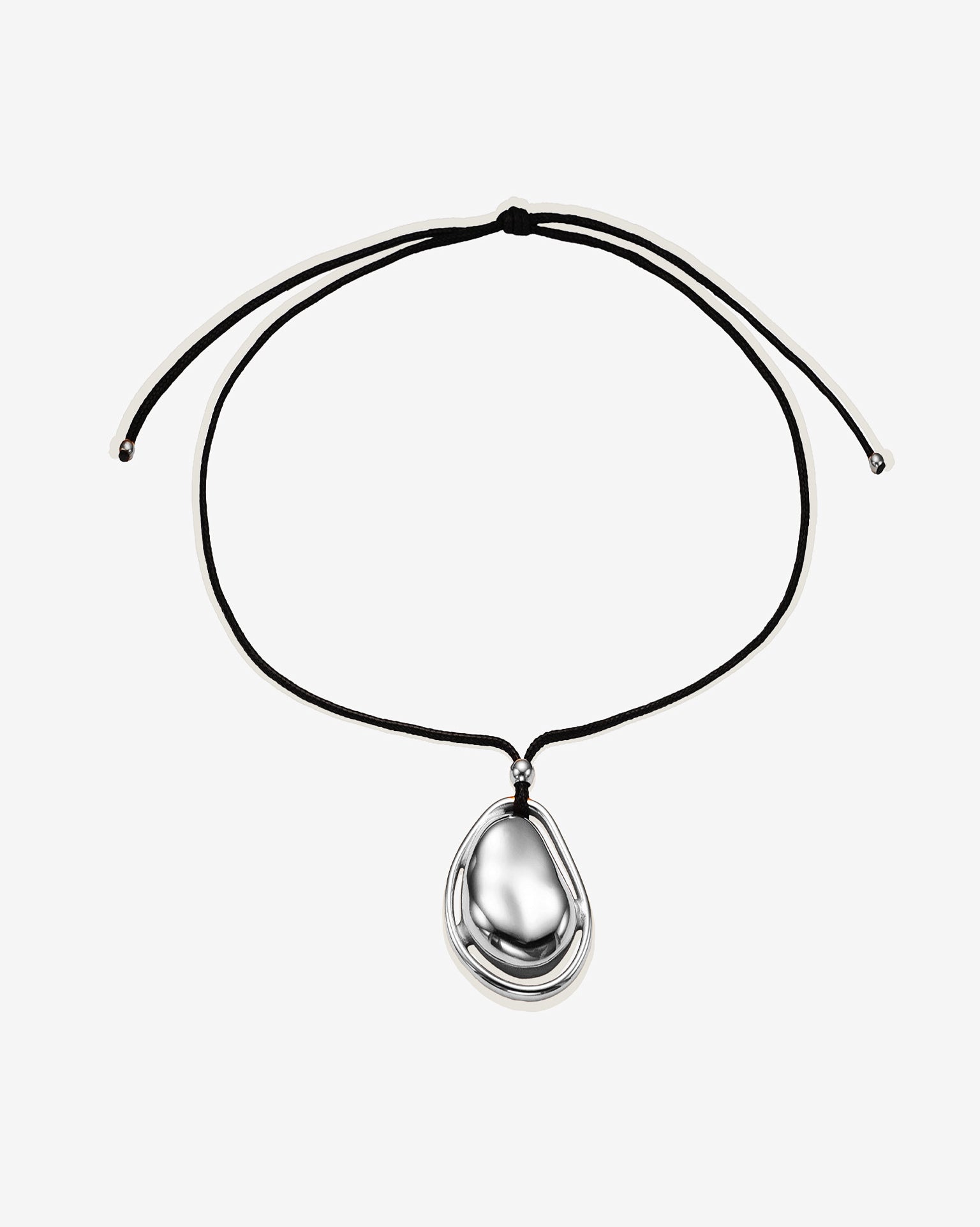 Necklace with a teardrop-shaped pendant on a black cord chain