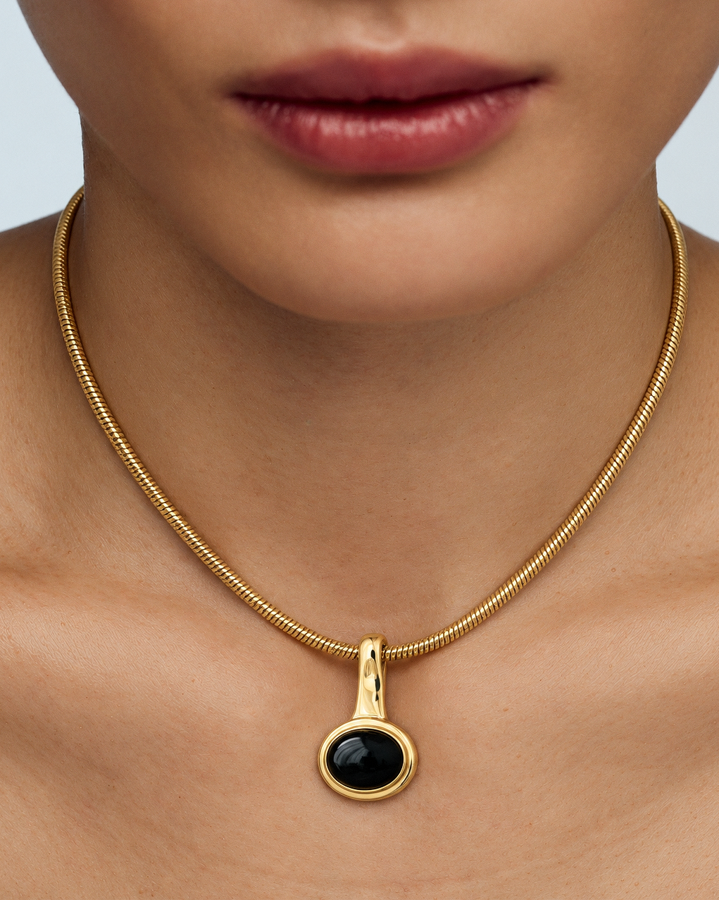 Black Onyx Pendant Necklace in gold or silver with round black stone pendant and sleek snake chain, modern sculptural statement jewelry for women