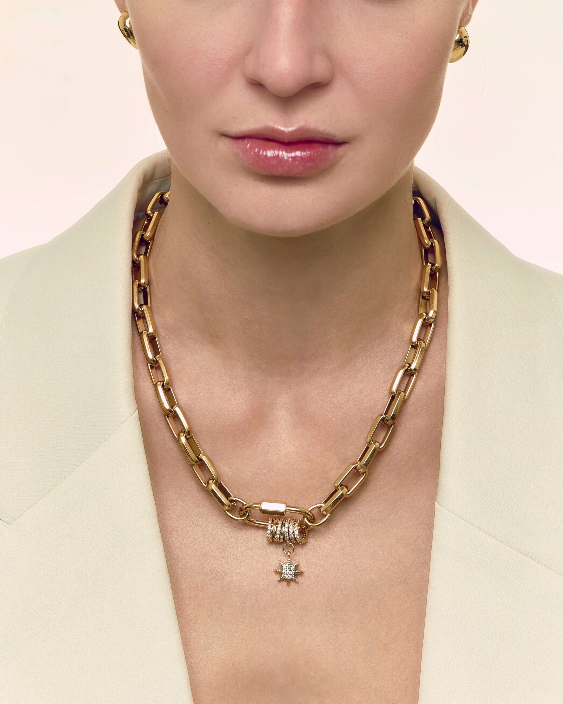Carabiner pave pendant with sparkling zircon charms on chunky oval link chain, perfect for layering or bold standalone styling.