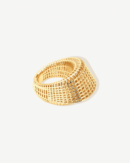 Close-up of a gold open-work grid ring featuring a wide band with geometric cutout design. The chunky 18k gold-plated stainless steel ring is non-tarnish, water-resistant, and hypoallergenic. Its sculptural, architectural-inspired open-work detailing creates a bold yet airy statement piece, ideal as a cocktail ring, stacking ring, or everyday fashion accessory.