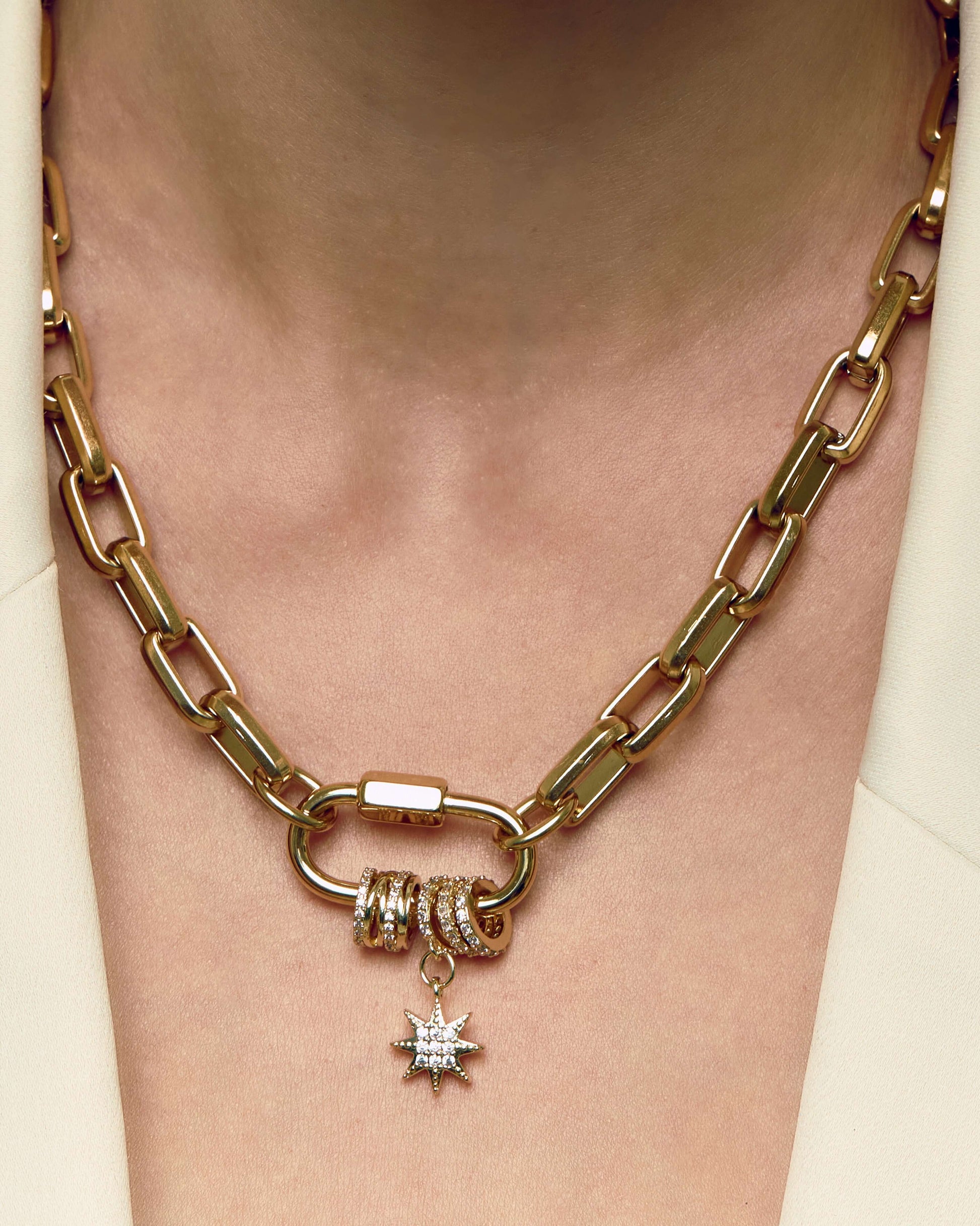 Carabiner pave pendant with sparkling zircon charms on chunky oval link chain, perfect for layering or bold standalone styling.