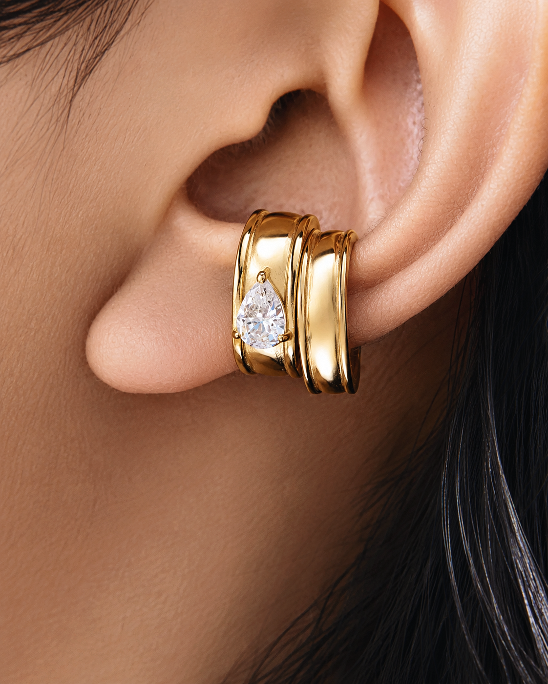 Gold Marquise Ear Cuff Set featuring a sparkling marquise crystal cuff and a matching plain cuff. Non-pierced statement ear cuffs designed for asymmetrical ear stacks, modern styling, and everyday wear.