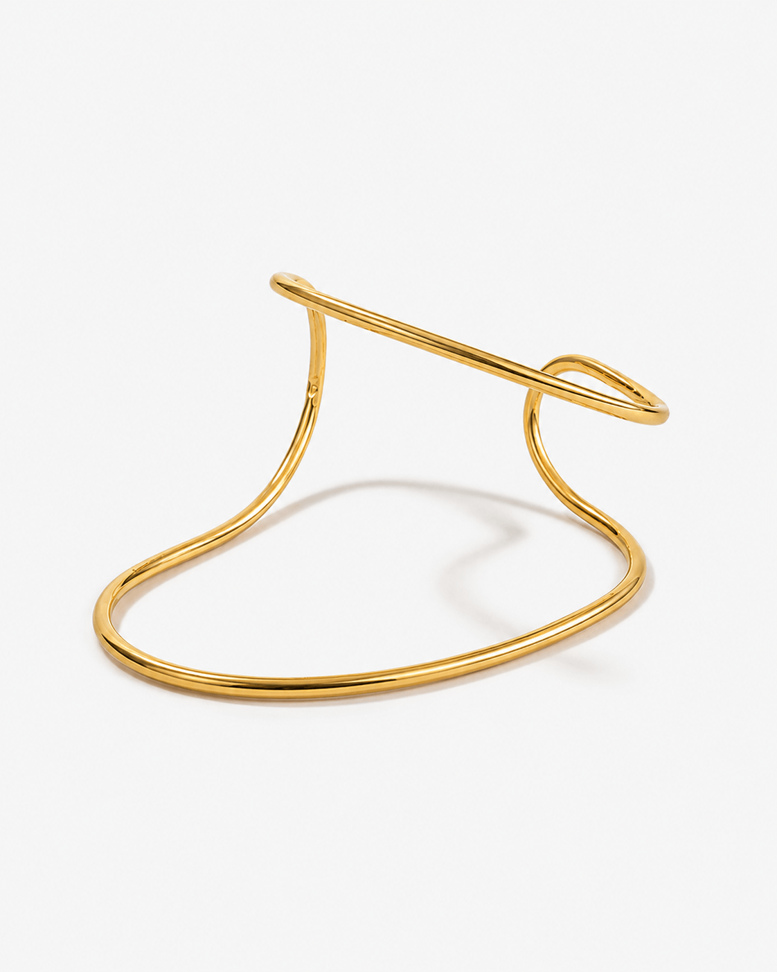 Sculptural palm bracelet in gold tone, modern statement hand bracelet with open cuff design, minimalist arm jewelry for women, bold contemporary gold bracelet, elegant fashion accessory for special occasions or everyday styling