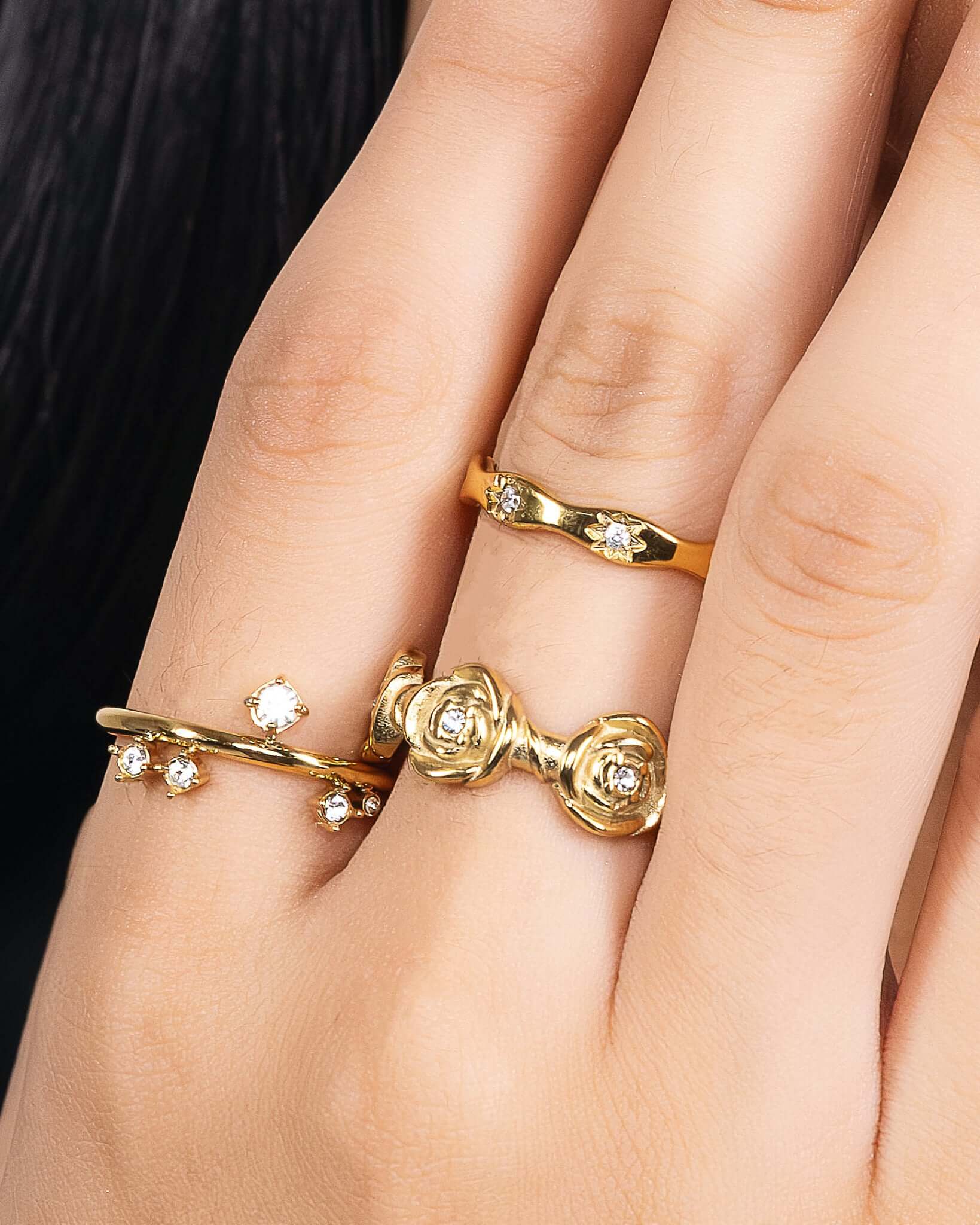 Stacked gold ring set with crystal stones, two matching 18K gold plated stainless steel rings featuring celestial starburst band and open crystal accent ring, minimalist stackable statement jewelry for women, elegant everyday fashion ring set