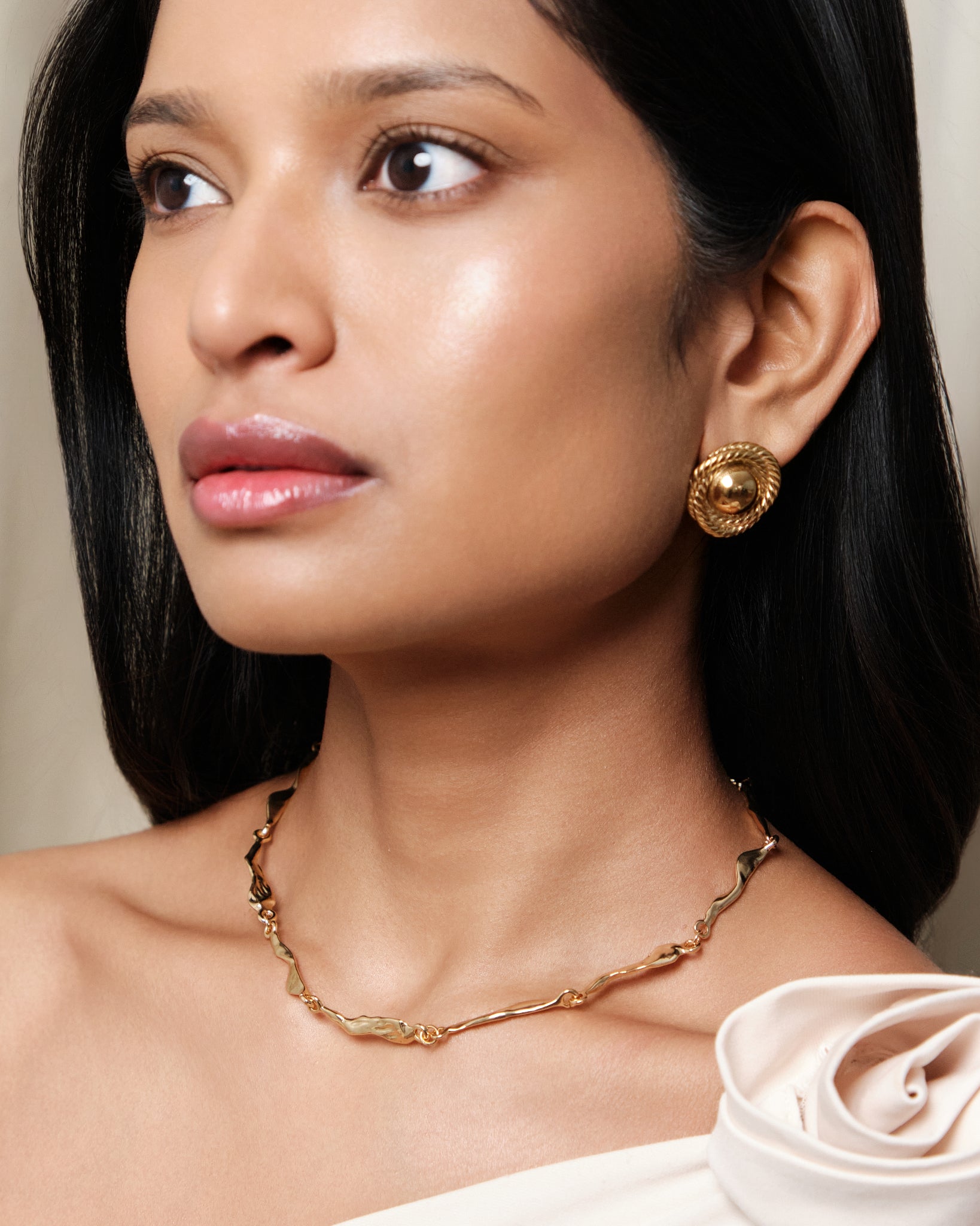 Gold rope dome stud earrings with textured twisted border and polished finish