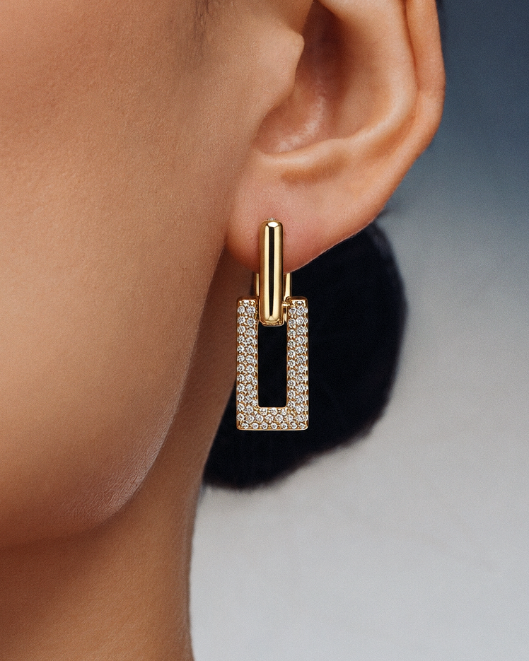 Pavé rectangle drop earrings in gold and silver with crystal-set geometric rectangular drops, polished hoop detailing and modern statement design by RRule