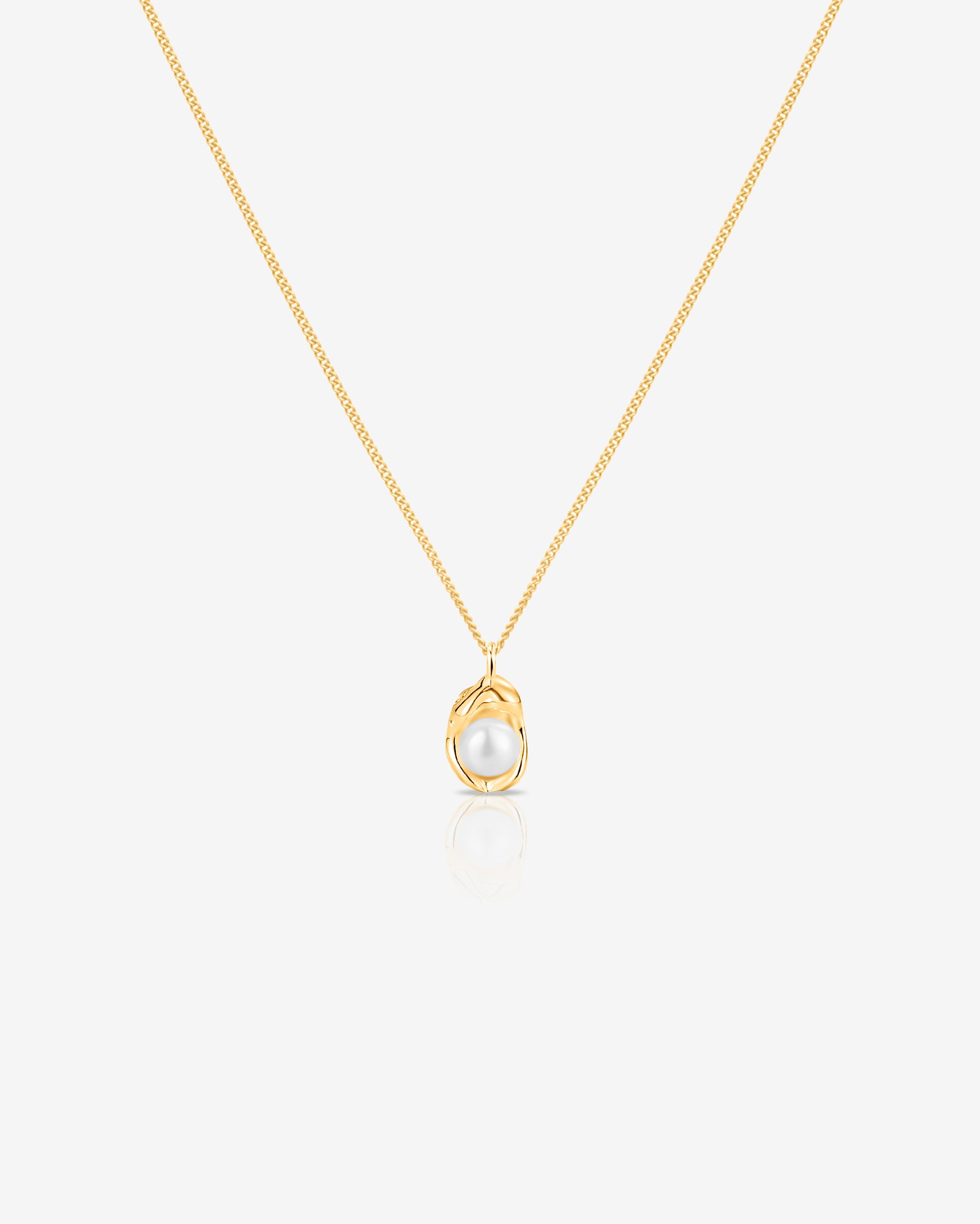 Dainty freshwater pearl pendant necklace on a delicate chain, perfect for everyday wear or adding a soft, elegant statement.