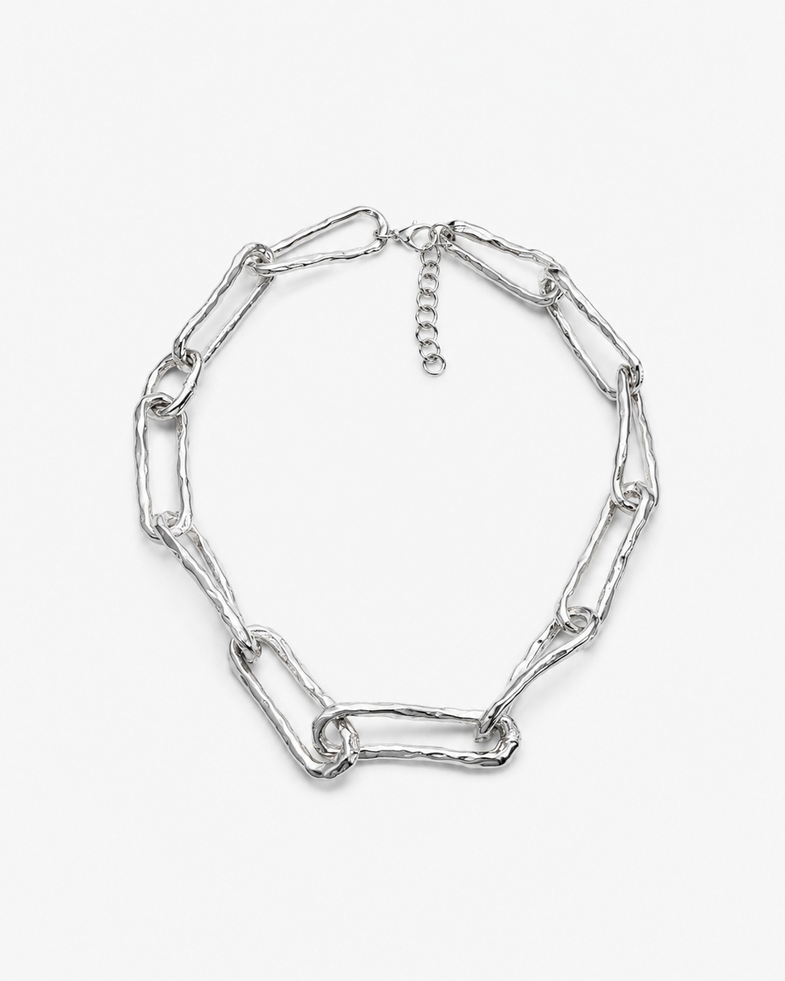 A chunky silver chain necklace with oversized, textured paperclip-style links and an adjustable clasp, shown on a light gray background.