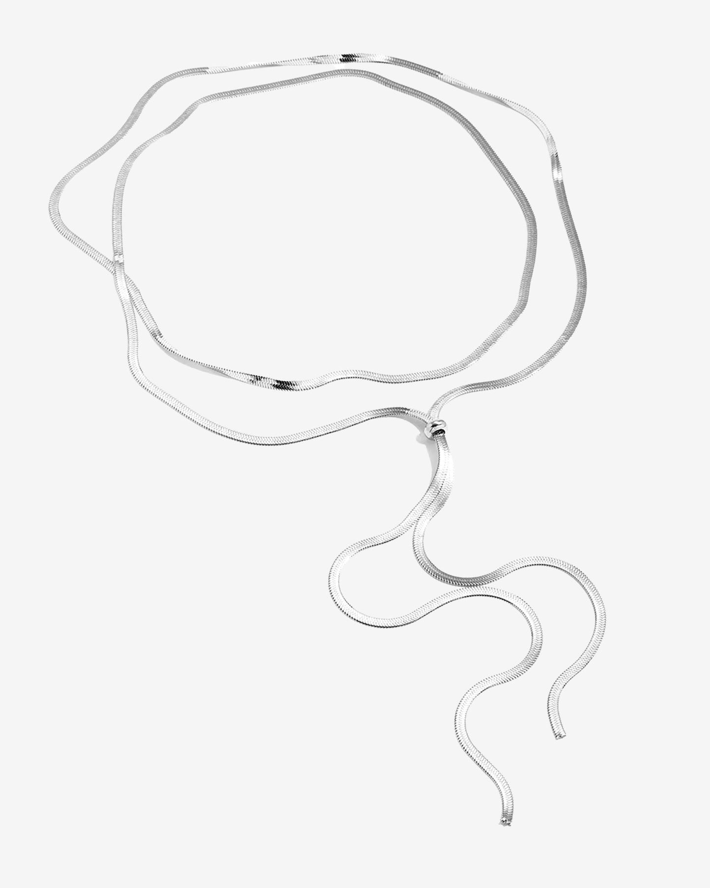 Adjustable gold or silver necklace with sleek snake chain and drop strands, wearable long or as a choker.