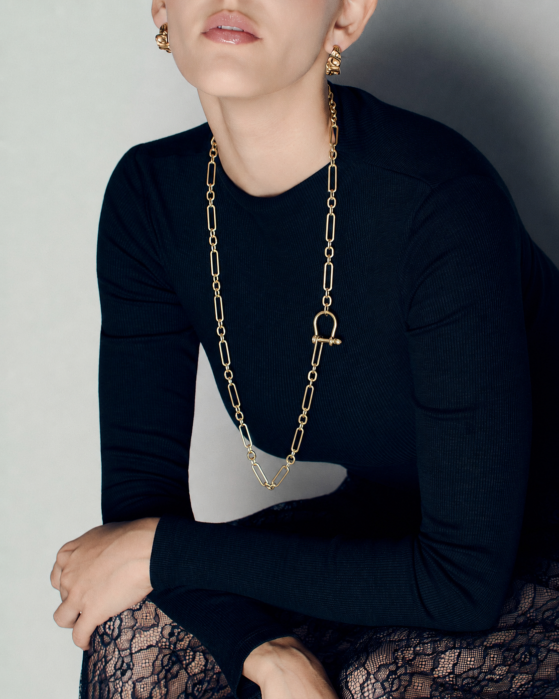 Long link chain toggle necklace in polished gold featuring elongated open links, sculptural horseshoe toggle clasp and versatile long or doubled styling by RRule