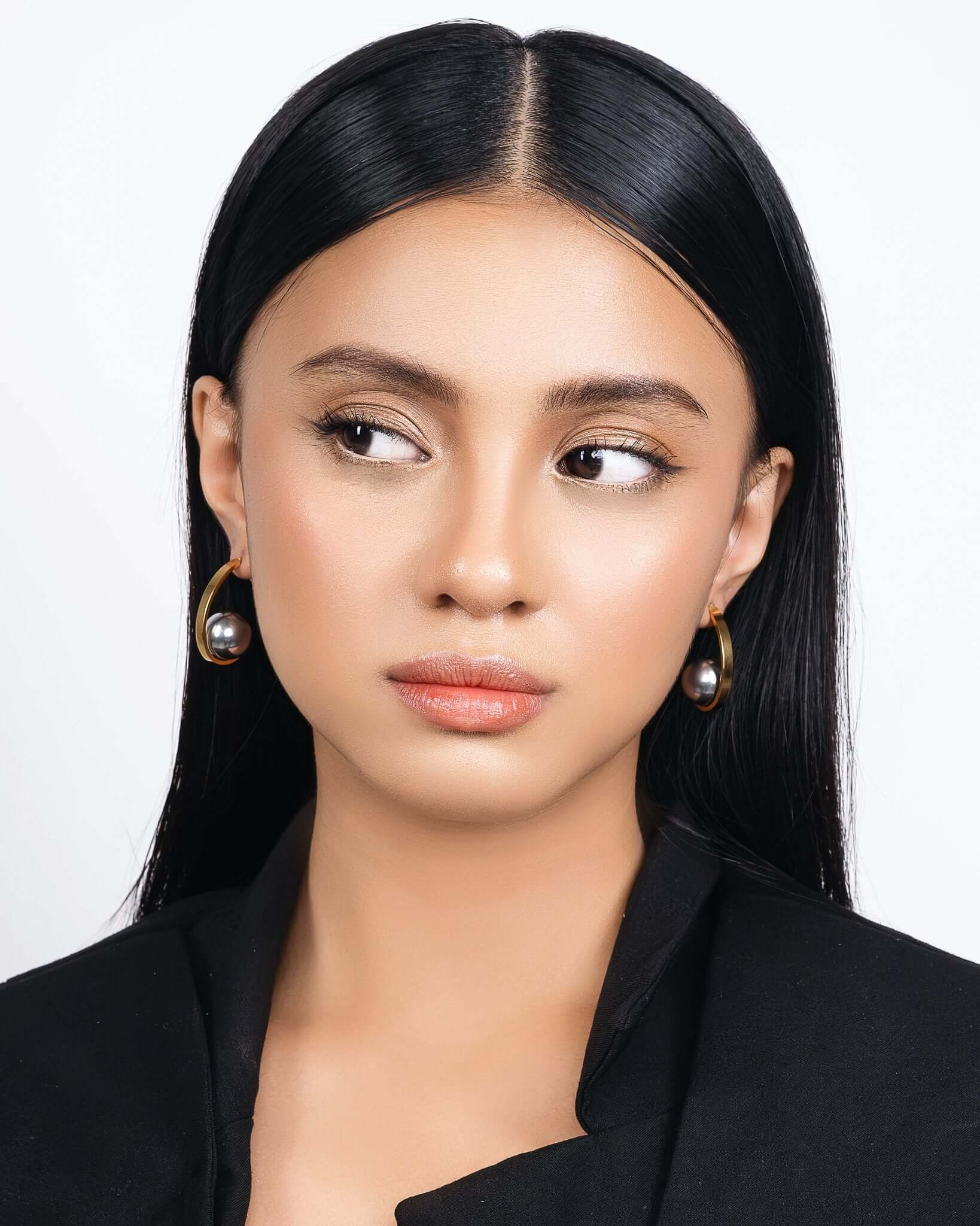 Chunky two tone ear jacket hoop earrings with front and back design in gold and silver, modern statement earrings for women, bold mixed metal hoops, trendy contemporary jewelry for everyday wear or special occasions