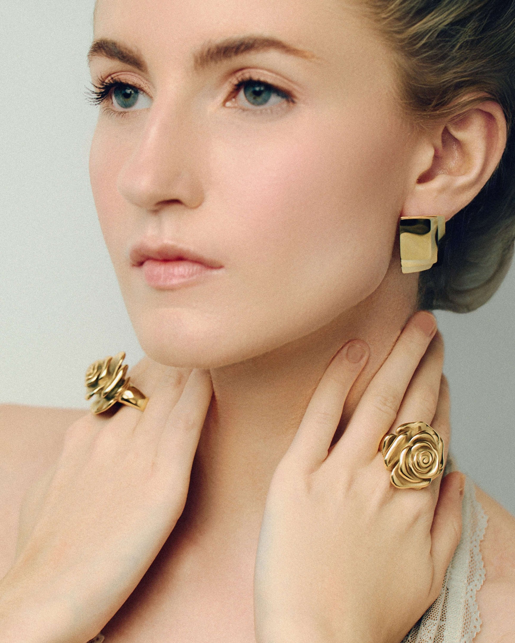 Oversized gold rose ring with sculpted layered petals in a realistic blooming flower design. Bold statement ring with a shiny polished finish, adding elegance and drama to any outfit. Perfect for floral jewelry lovers looking for a standout piece for everyday wear, events, or special occasions.