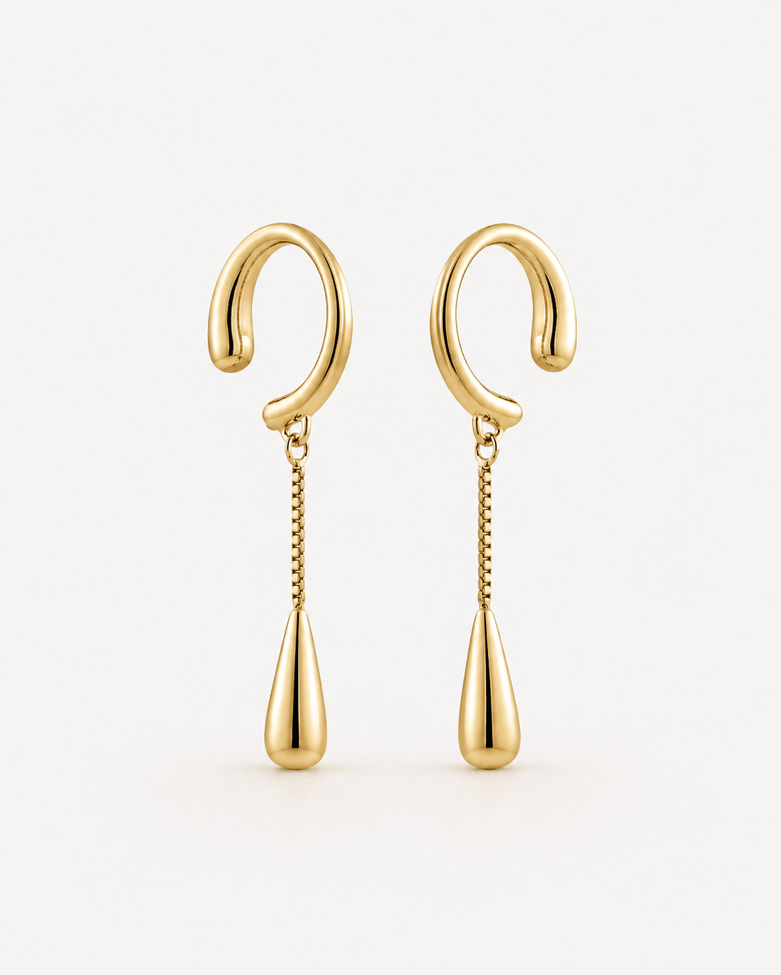 Drop dangle ear cuff in gold or silver finish, minimalist no piercing ear cuff with dangling teardrop charm, modern statement ear jewelry for women, elegant chain drop ear wrap, trendy everyday or evening ear cuff styling