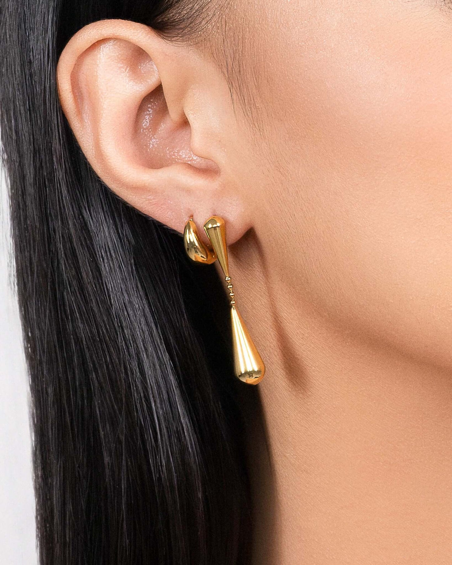 Double teardrop drop stud earrings in gold or silver finish, modern minimalist dangling earrings for women, elegant statement teardrop jewelry, sleek long drop earrings, trendy everyday or evening earrings gift for her
