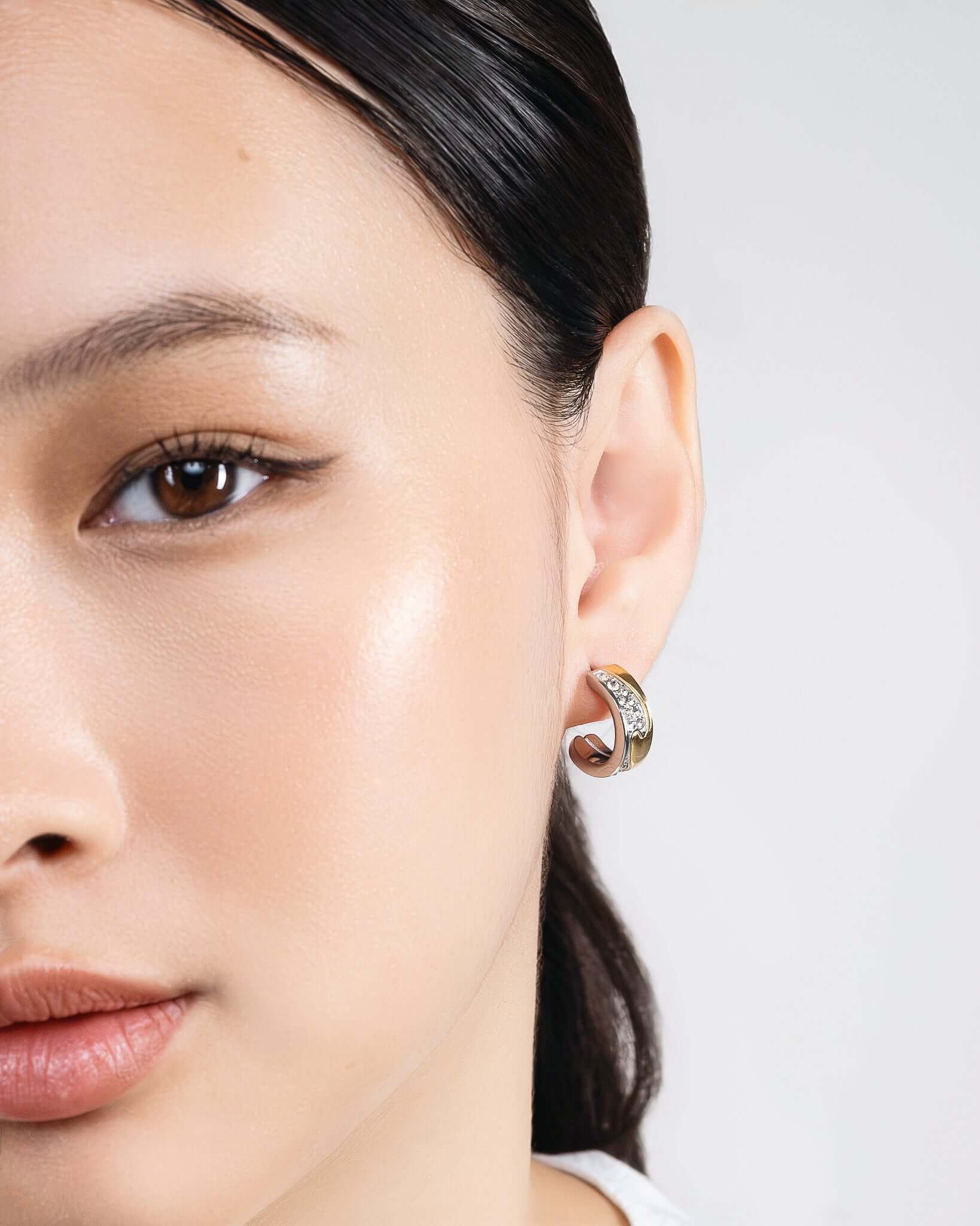 Two tone CZ hoop earrings in gold and silver with sparkling crystal pavé stones, chunky huggie hoop earrings for women, modern mixed metal statement jewelry