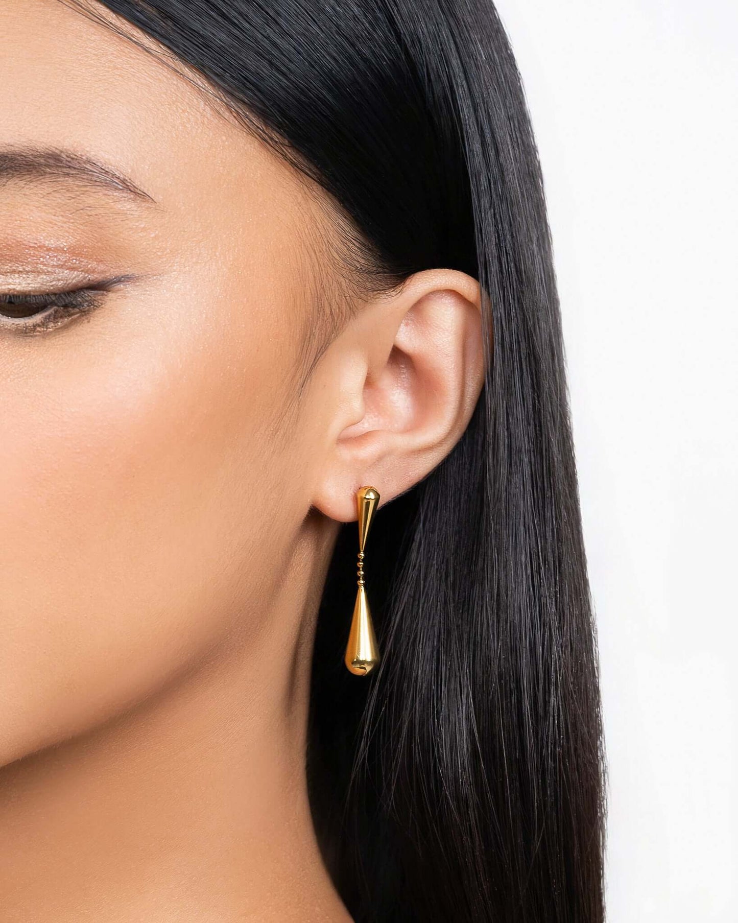 Double teardrop drop stud earrings in gold or silver finish, modern minimalist dangling earrings for women, elegant statement teardrop jewelry, sleek long drop earrings, trendy everyday or evening earrings gift for her