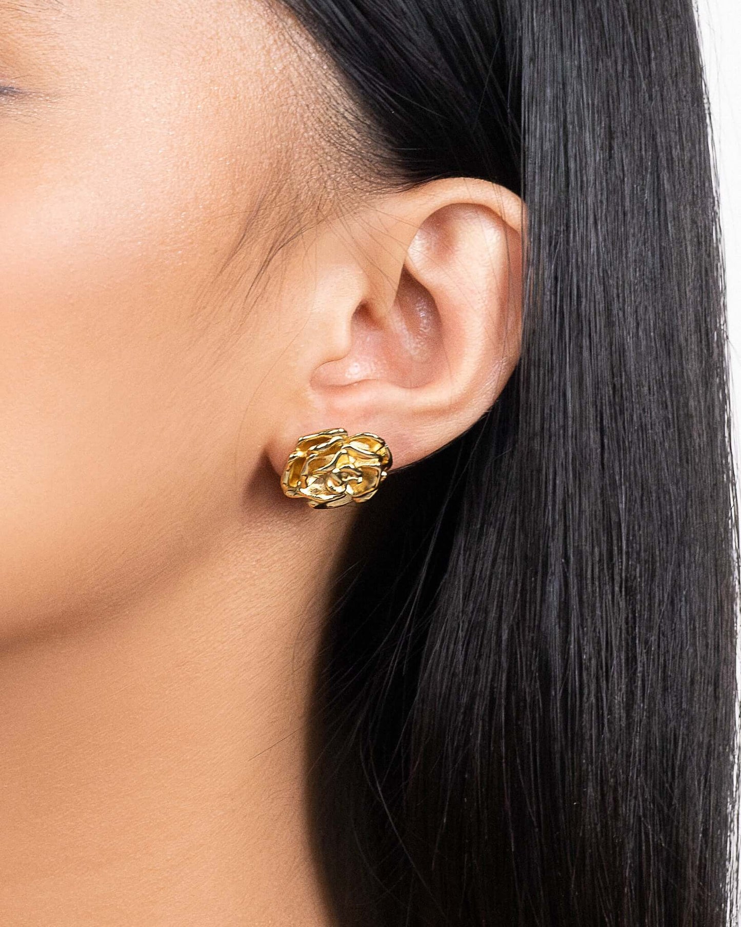 Gold rose stud earrings for women, sculptural flower earrings with textured petals, romantic floral statement studs, elegant gold flower jewelry, trendy feminine earrings for everyday wear, weddings, or special occasions