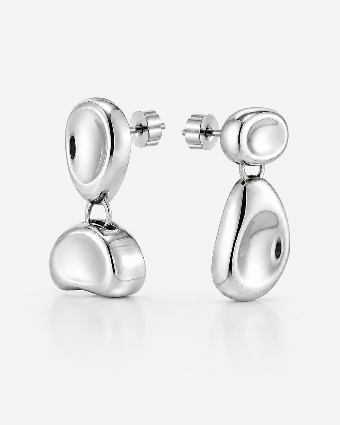 Double Bean Drop Earrings in gold or silver finish featuring a sculptural organic bean design, polished statement drop earrings, modern minimalist jewelry, chunky contemporary earrings for everyday wear and special occasions.
