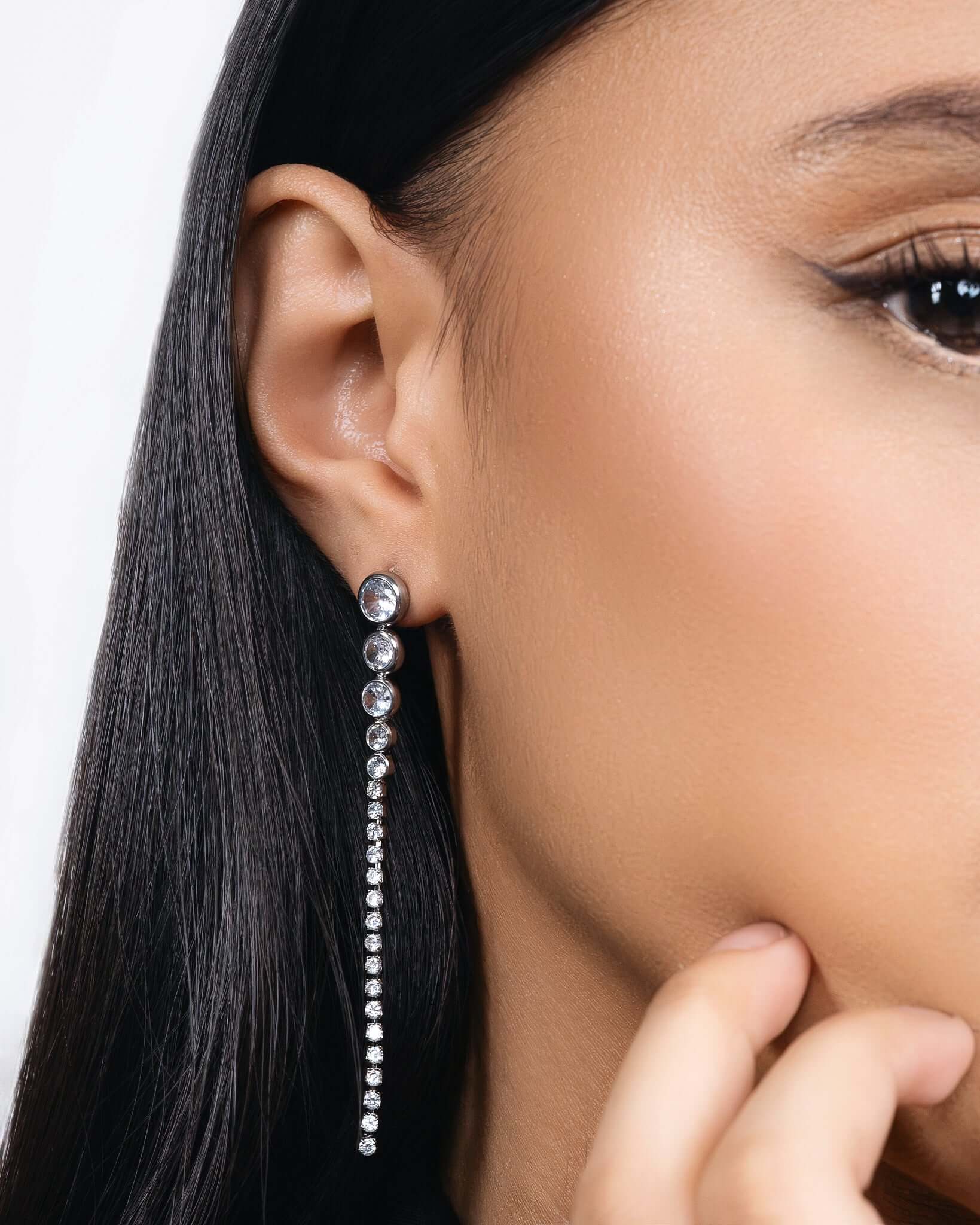 CZ crystal long drop earrings in gold or silver finish, elegant linear crystal earrings for women, sparkling statement drop earrings, modern dangling bridal jewelry, minimalist long crystal earrings for evening wear or special occasions