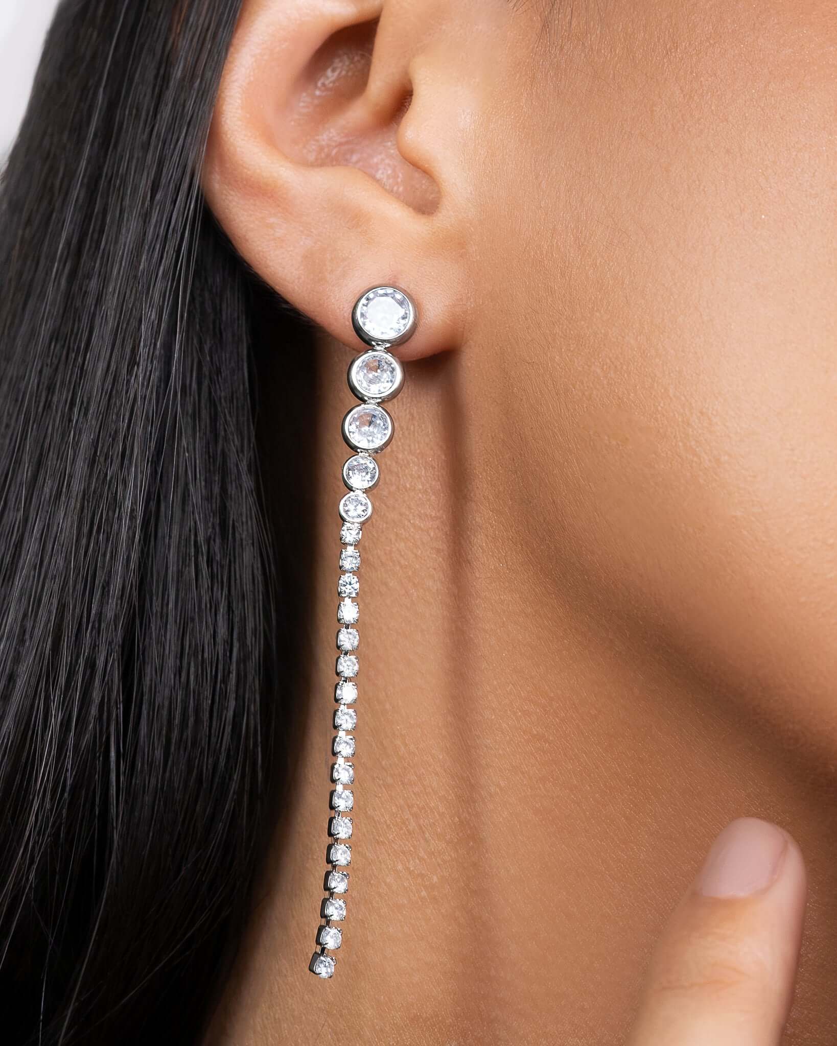 CZ crystal long drop earrings in gold or silver finish, elegant linear crystal earrings for women, sparkling statement drop earrings, modern dangling bridal jewelry, minimalist long crystal earrings for evening wear or special occasions