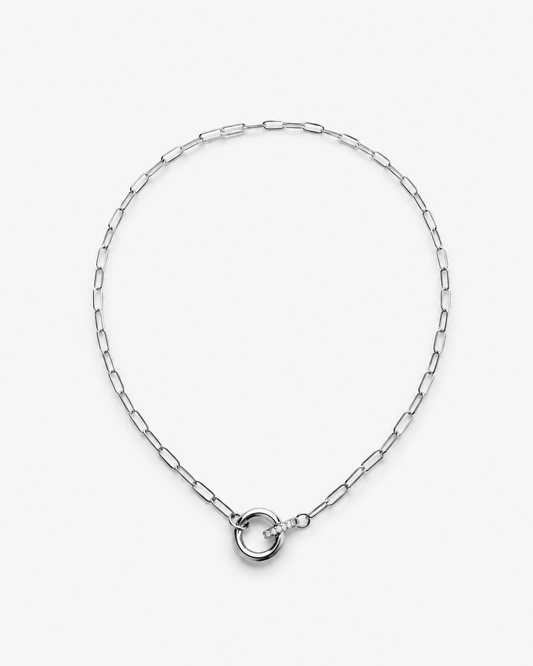 Paperclip Toggle Charm Necklace in gold and silver with elongated links, circular toggle clasp and sparkling zircon charm detail by RRule.