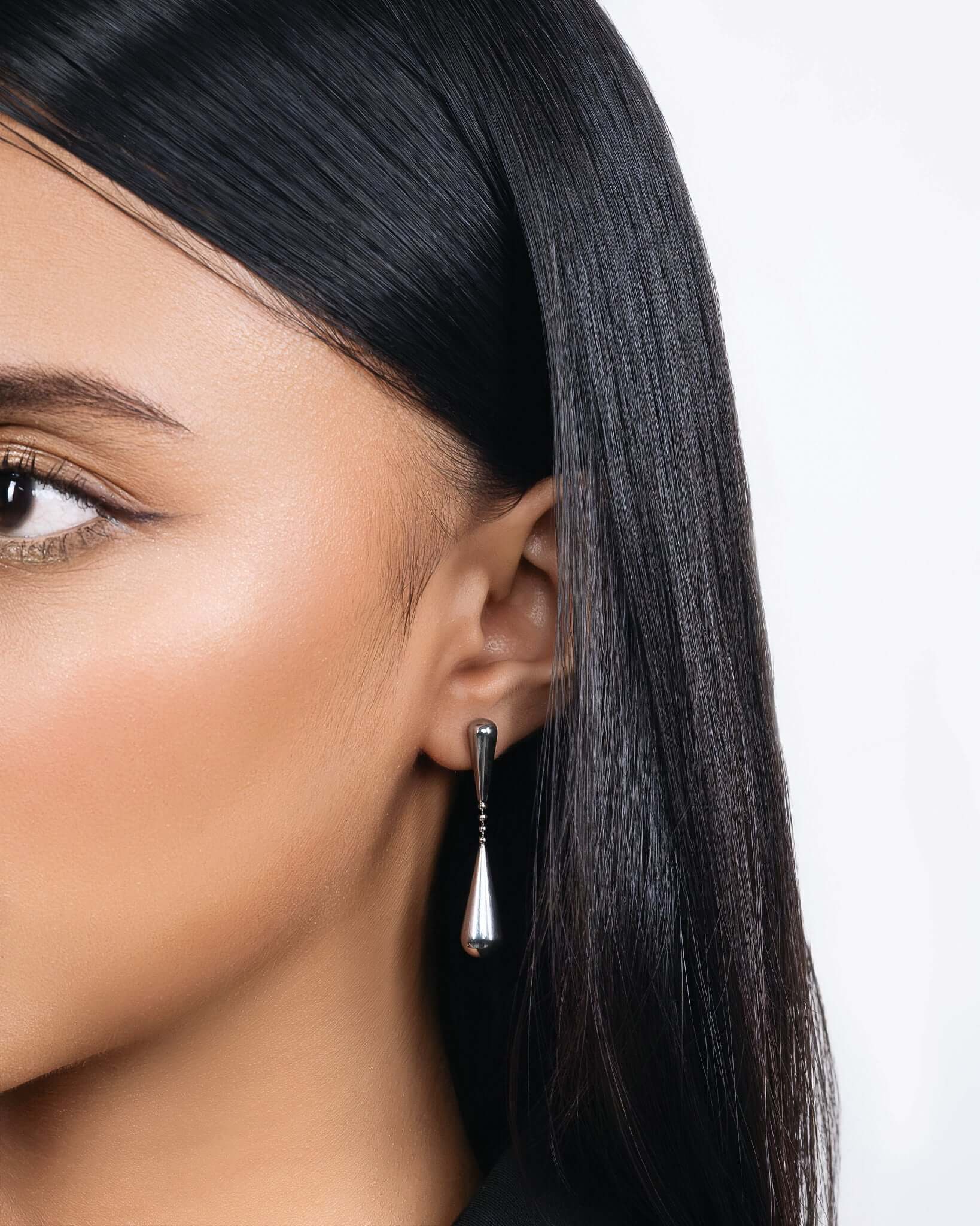 Double teardrop drop stud earrings in gold or silver finish, modern minimalist dangling earrings for women, elegant statement teardrop jewelry, sleek long drop earrings, trendy everyday or evening earrings gift for her