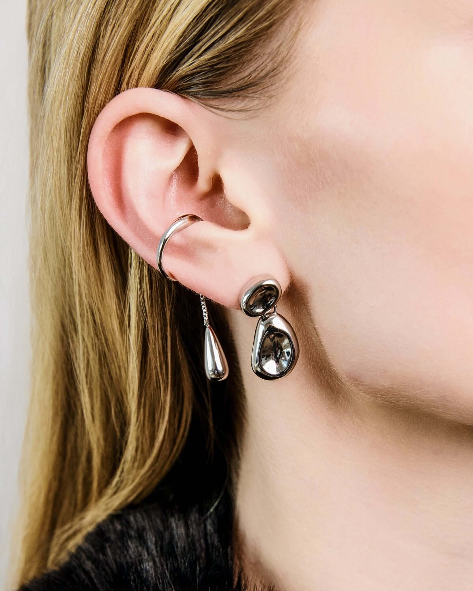 Drop dangle ear cuff in gold or silver finish, minimalist no piercing ear cuff with dangling teardrop charm, modern statement ear jewelry for women, elegant chain drop ear wrap, trendy everyday or evening ear cuff styling