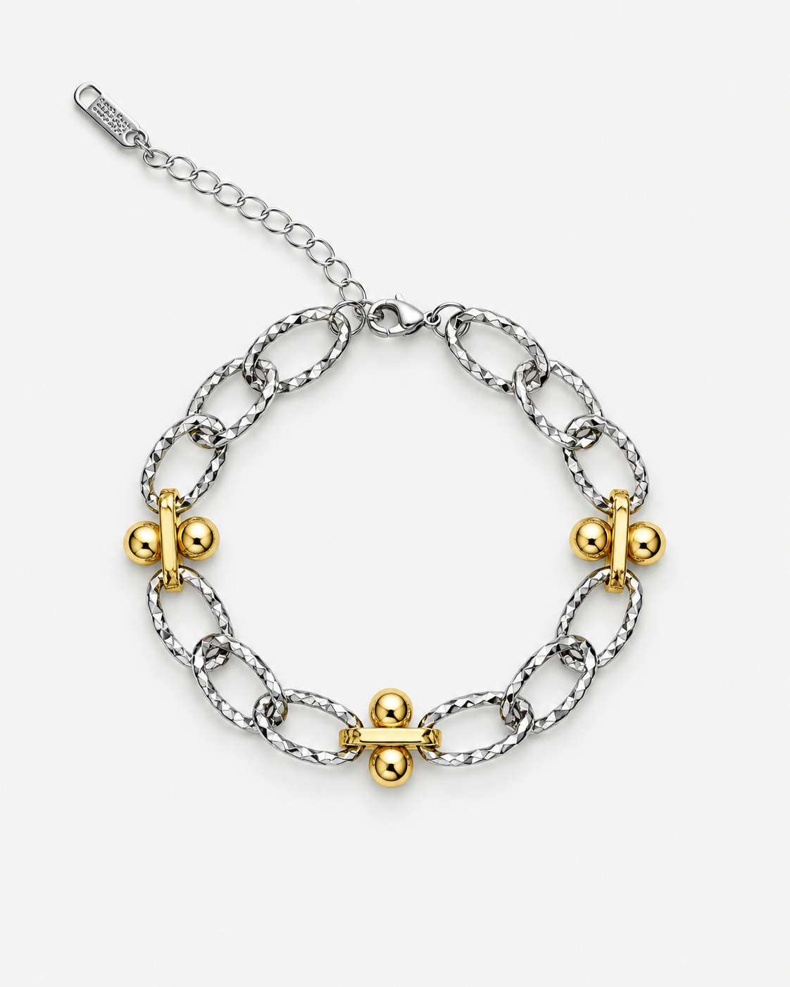 A silver-toned chain bracelet with four gold-toned decorative links, displayed on a clean light gray background.