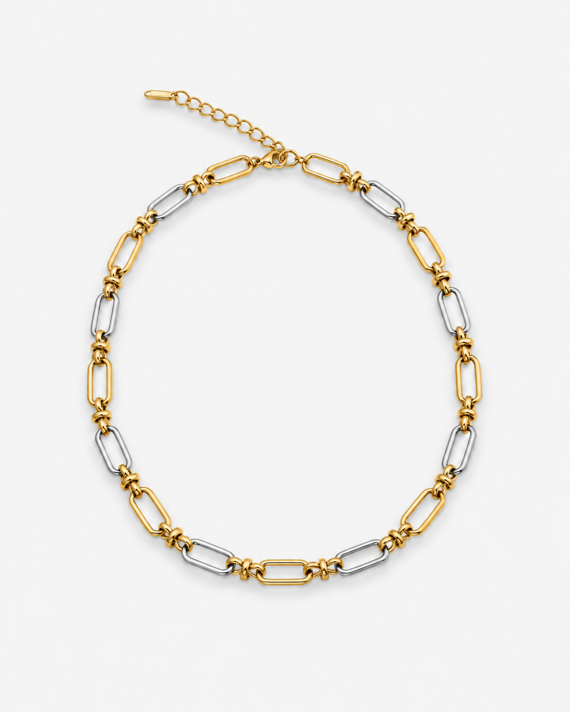 Two tone link chain necklace in polished gold and silver with alternating elongated links, sculptural connectors and a modern mixed metal statement design by RRule