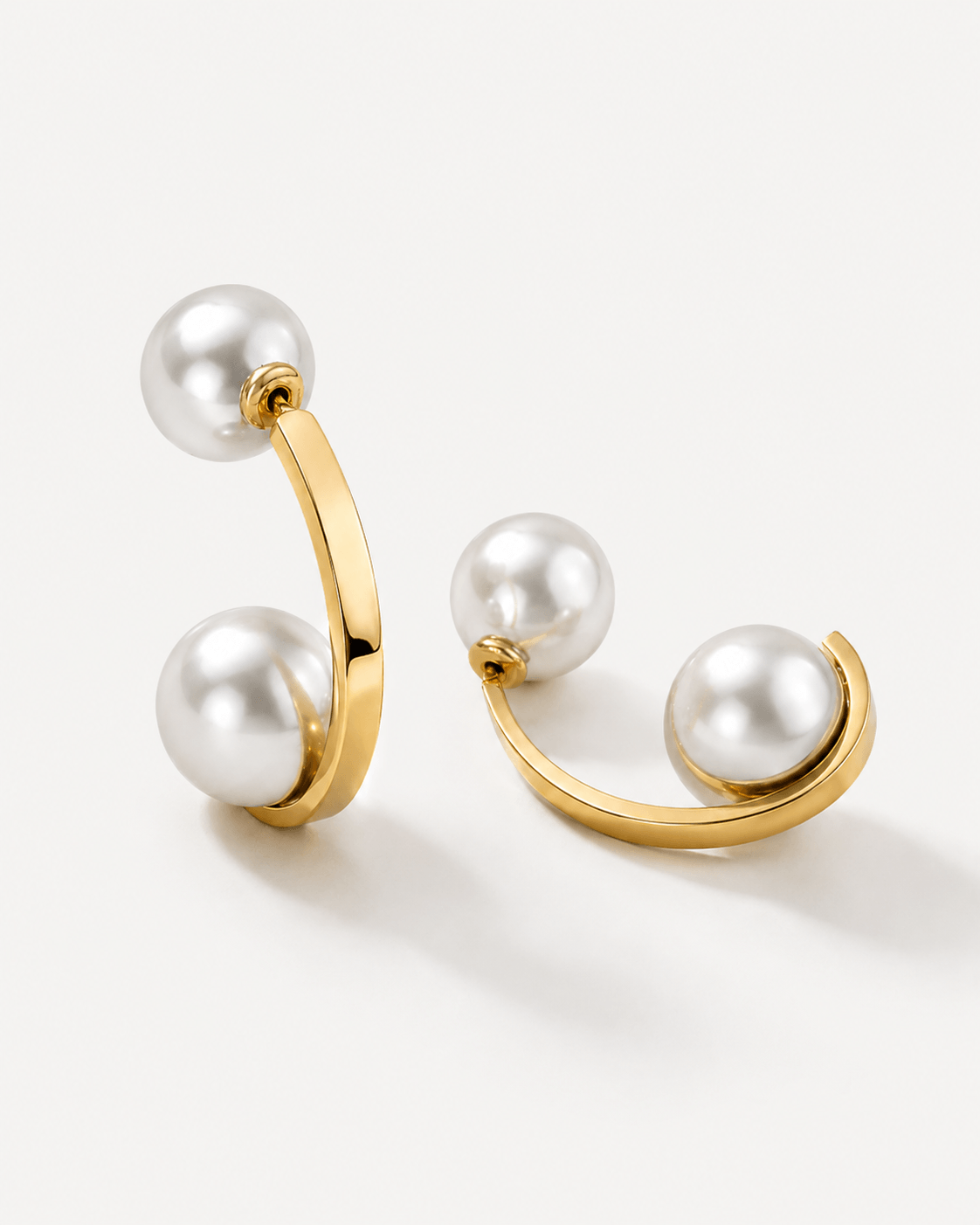 Chunky two tone ear jacket hoop earrings with front and back design in gold and silver, modern statement earrings for women, bold mixed metal hoops, trendy contemporary jewelry for everyday wear or special occasions